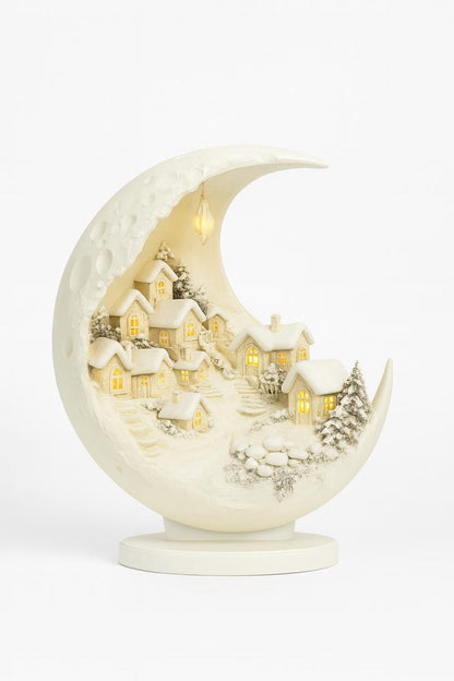 Leuchtendes Winterdorf auf Halbmond